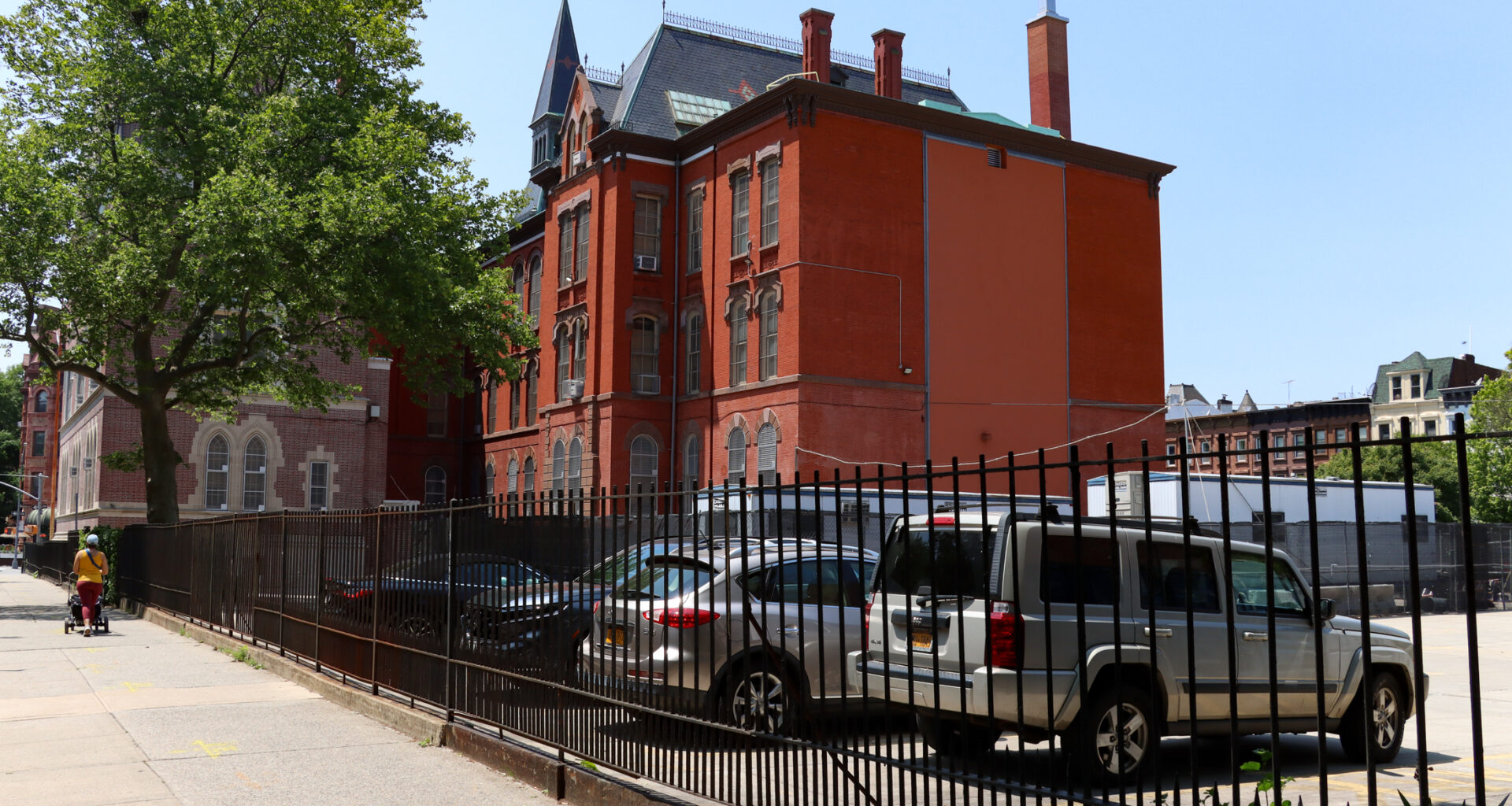 view on macon street of the parking lot and the school
