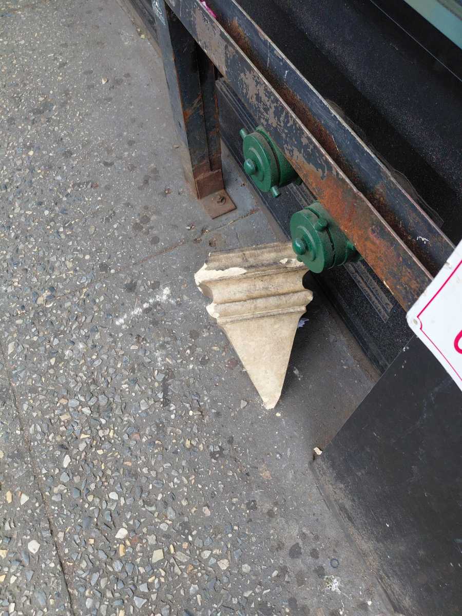 A 14-year-old boy was struck in the head by a heavy piece of concrete that fell from the façade of a commercial building on 82nd Street in Jackson Heights.