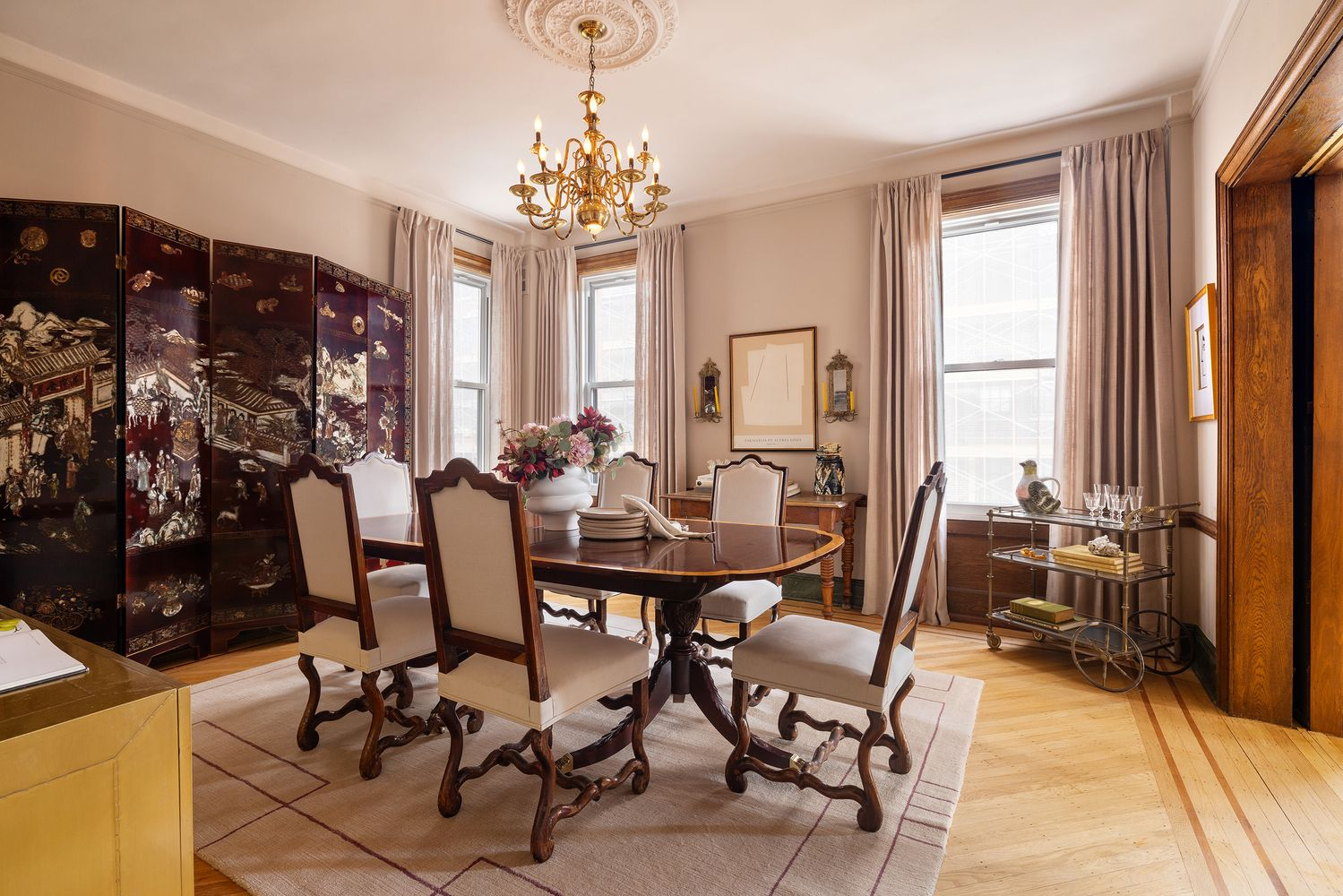 dining room with two exposures, wood floor