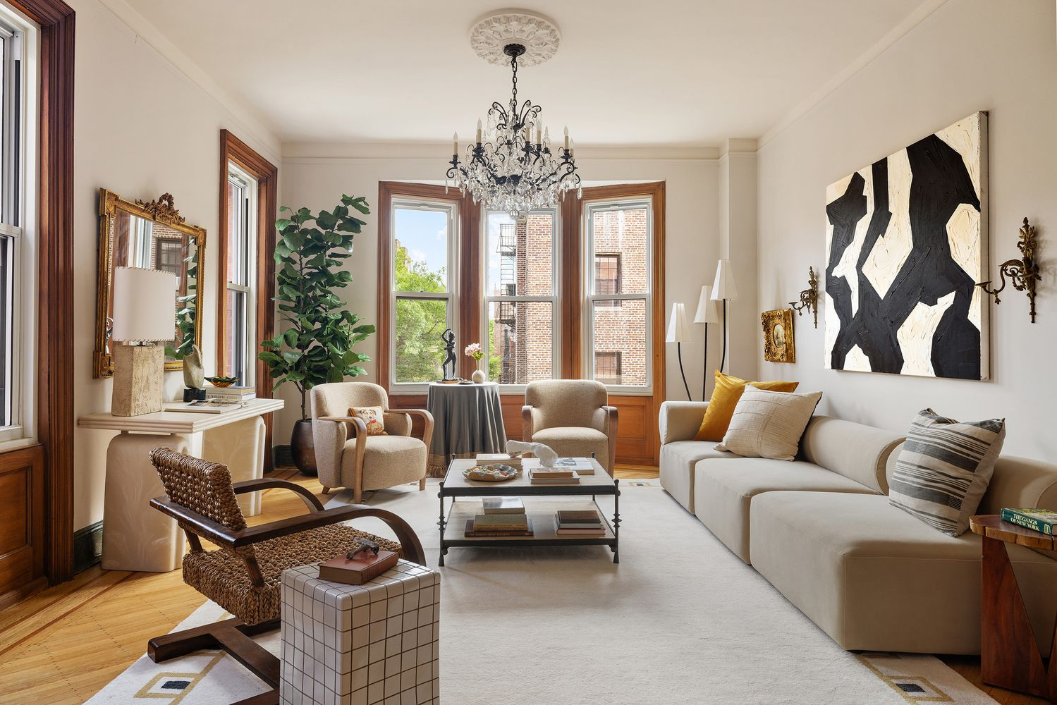 living room with two exposures, wood floors