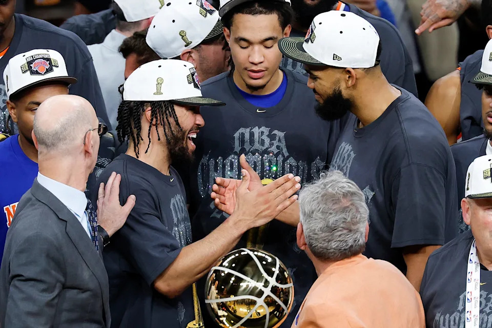 Jalen Brunson #11 and Karl-Anthony Towns #32 of the New York Knicks celebrate.
