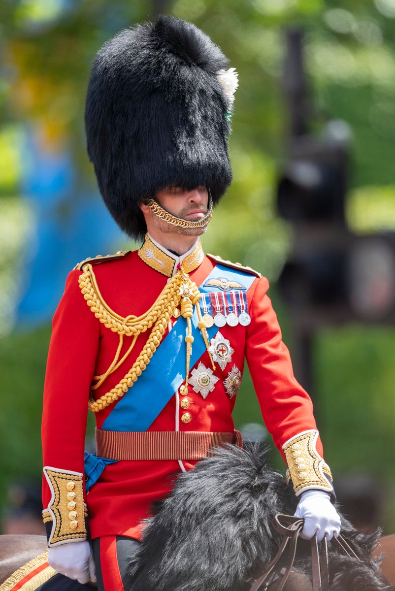 Prince William rides on horseback as senior members of the royal family participate in the ceremony.