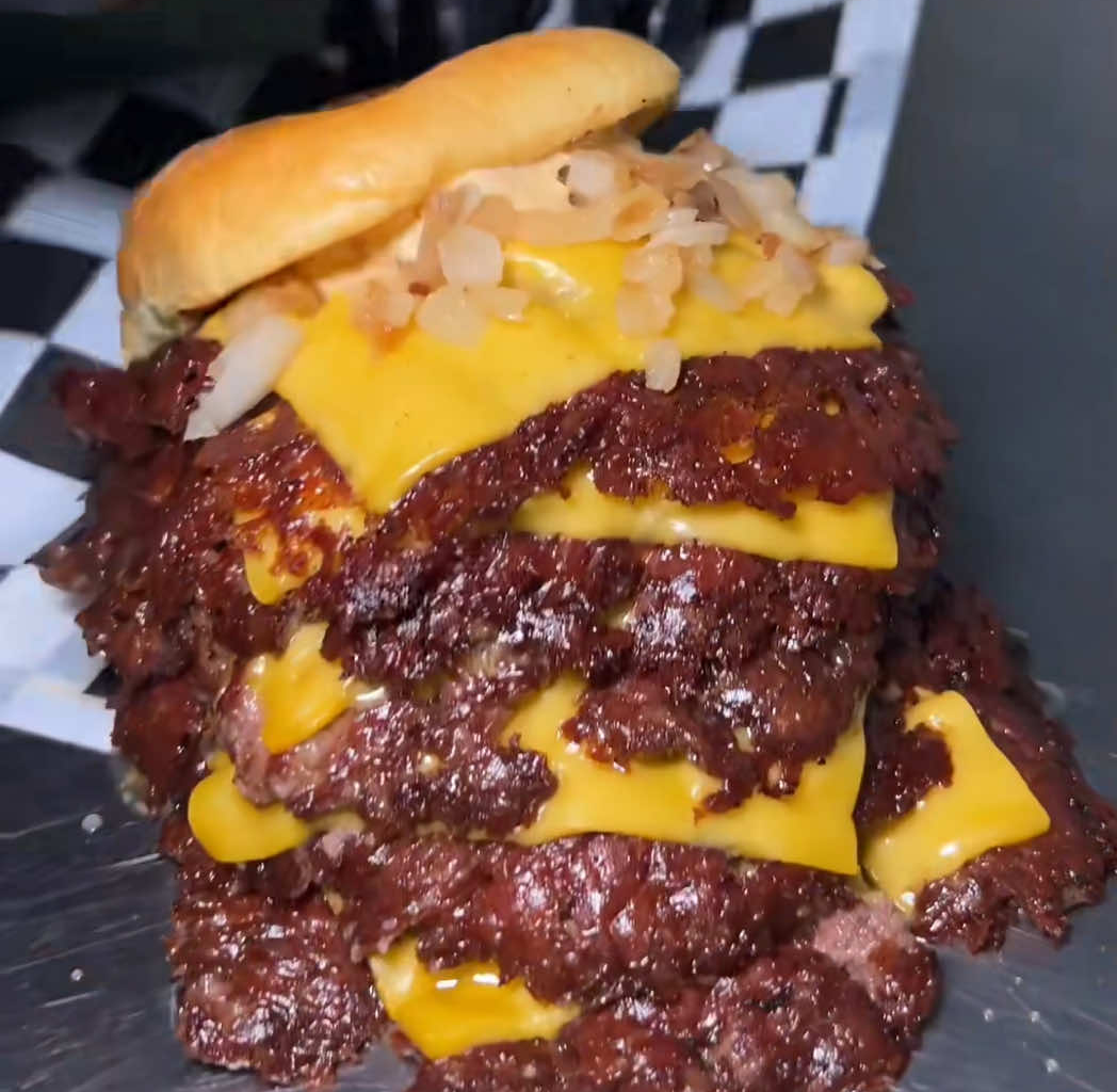 This Lower Manhattan Spot Is Serving A Five-Stack Smash Burger That Definitionally Defies Gravity