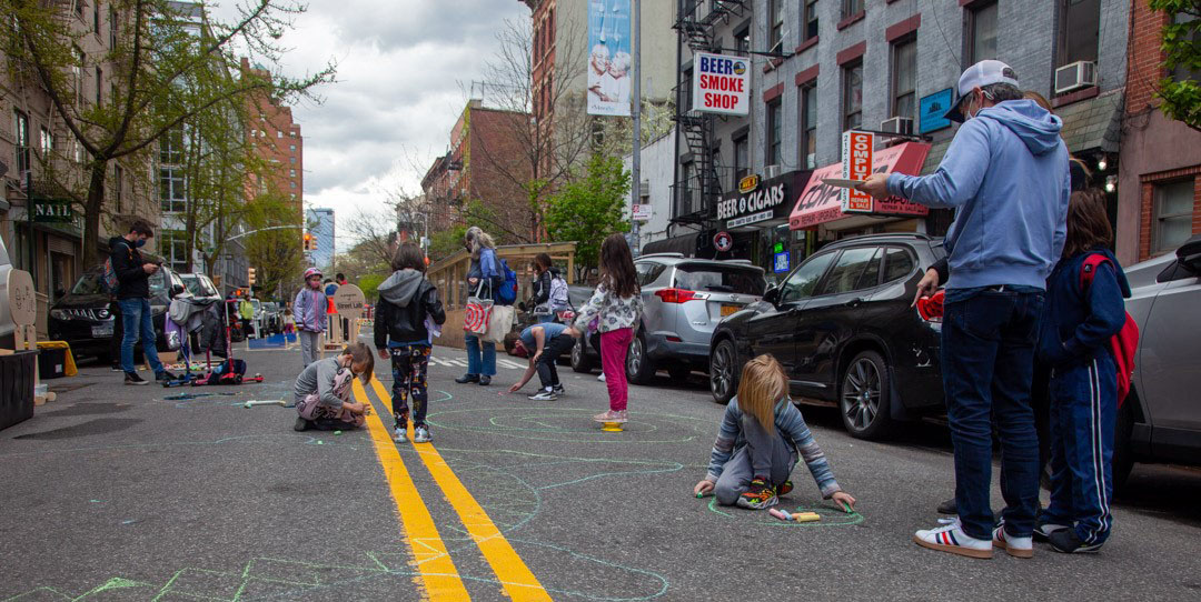 Children play during open street