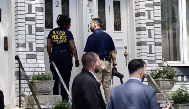 Police investigate outside the Bay Ridge home where Maria Santos Flores was found dead. Photo: Loudlabs News NYC