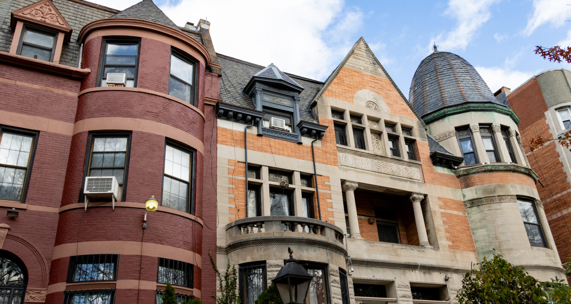 brick mansions with stone details