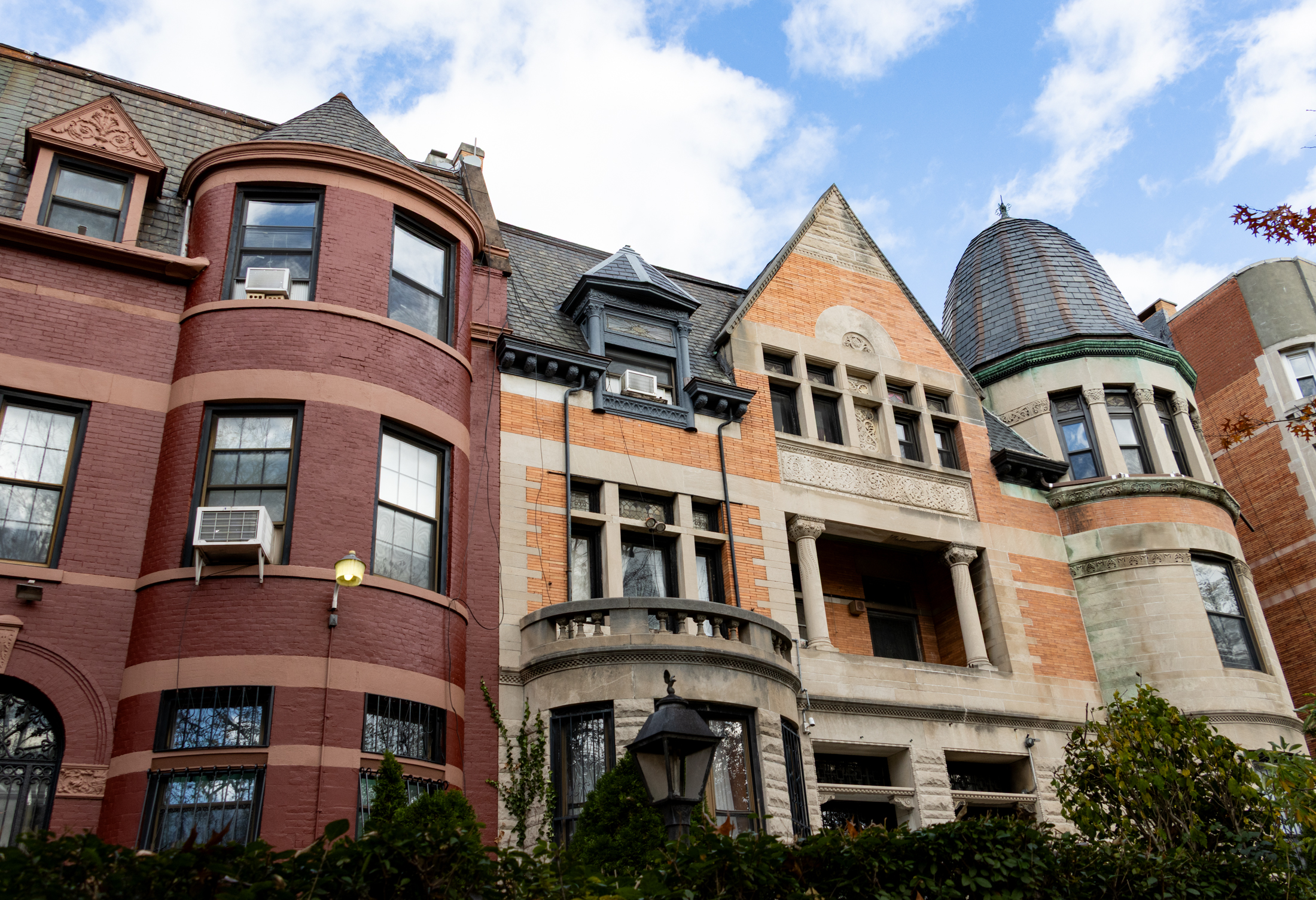 brick mansions with stone details