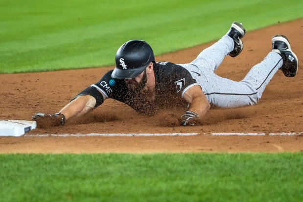 Chicago White Sox Tristan Peters dives to first base during the sixth inning of a baseball game against the New York Yankees, Tuesday, June 16, 2026, in New York. (AP Photo/Eduardo Munoz Alvarez)