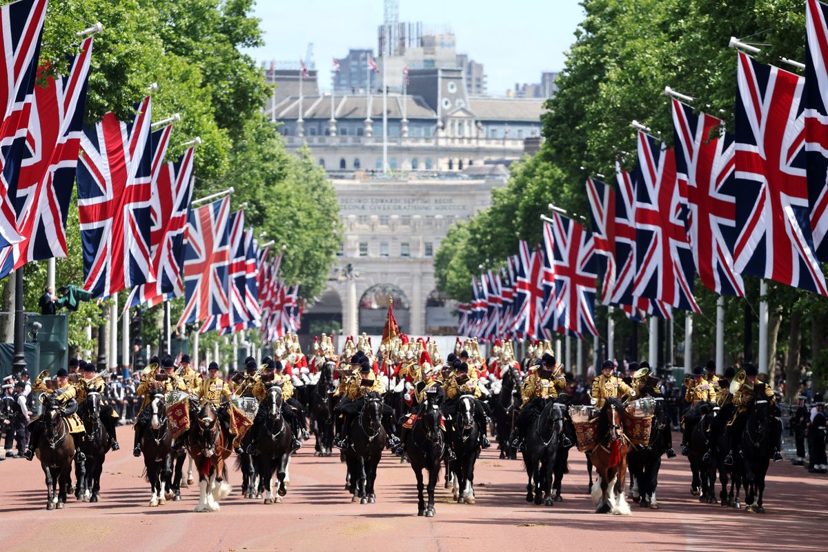 Mounted troops ride through The Mall as part of the spectacular Trooping the Colour parade.