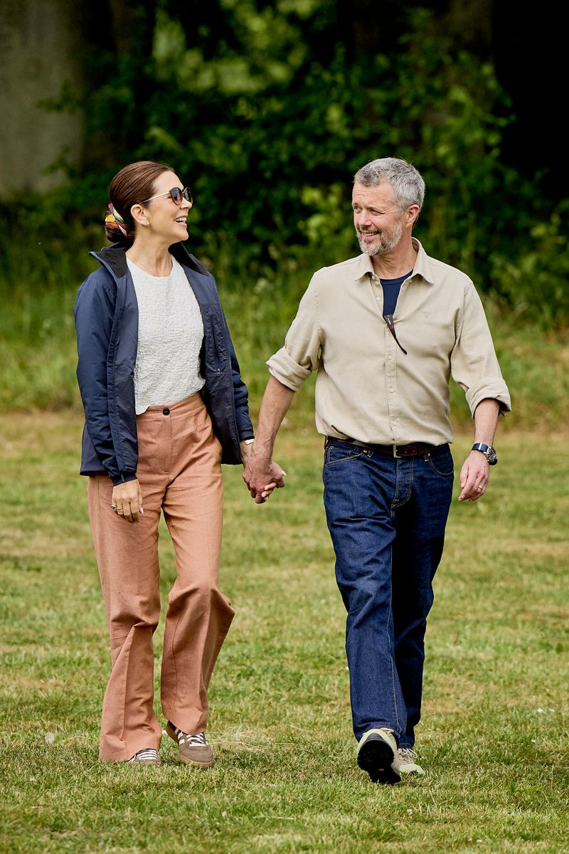 Queen Mary stepped out in a textured white blouse previously worn by Princess Josephine, adding a meaningful family touch to her summer tour look.