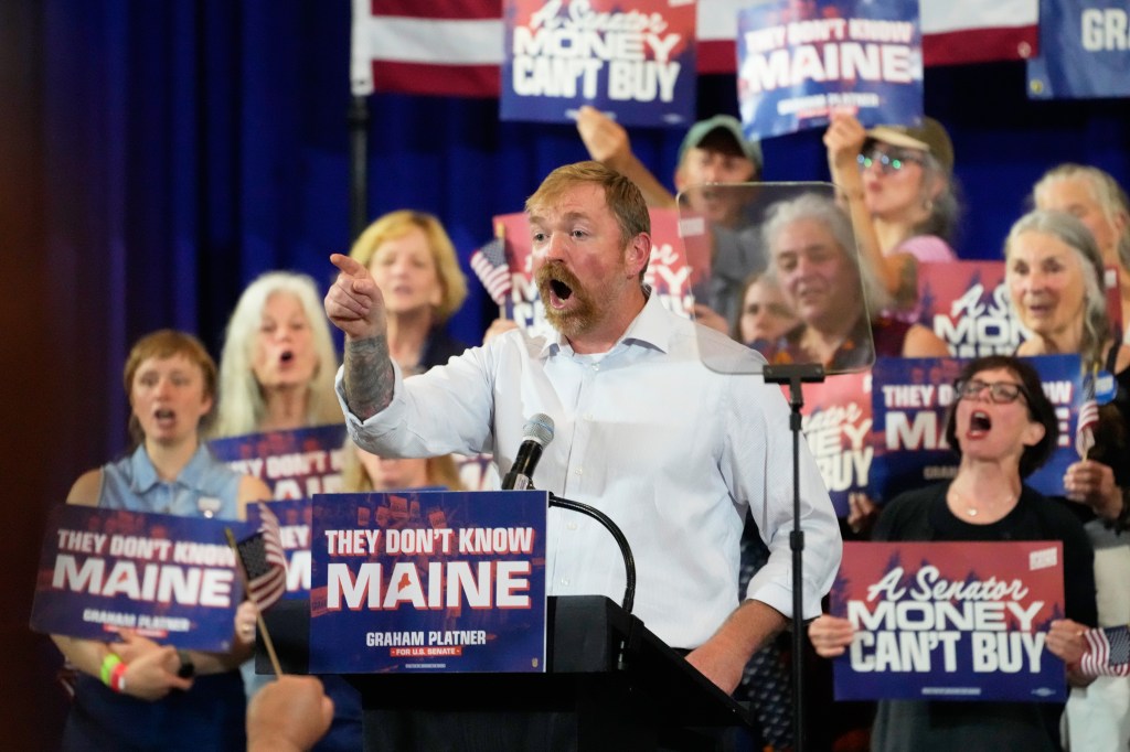 Democratic U.S. Senate candidate Graham Platner speaks at his primary election night watch party.