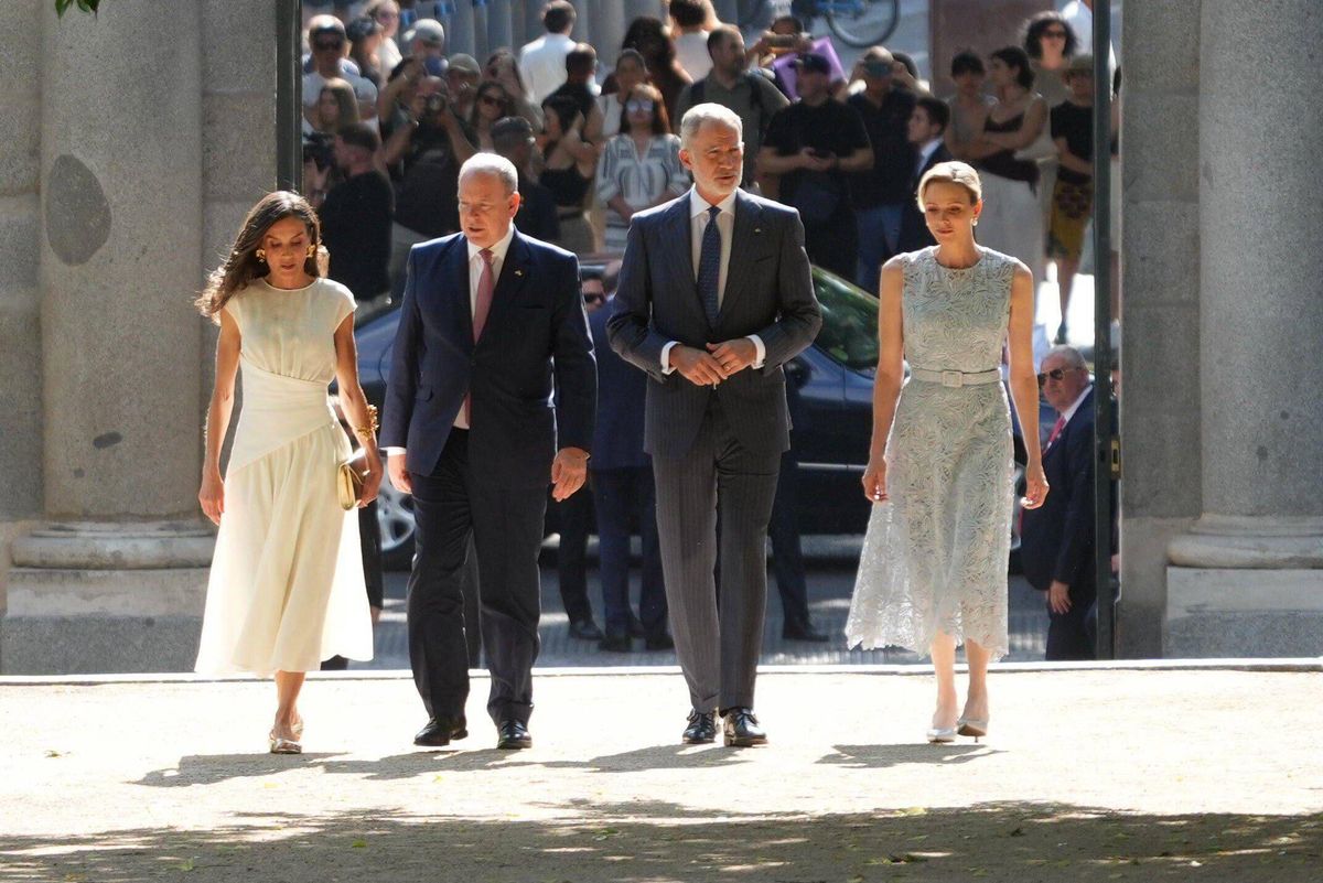 The Spanish and Monegasque royal couples walk through the Royal Botanical Garden during the historic encounter.