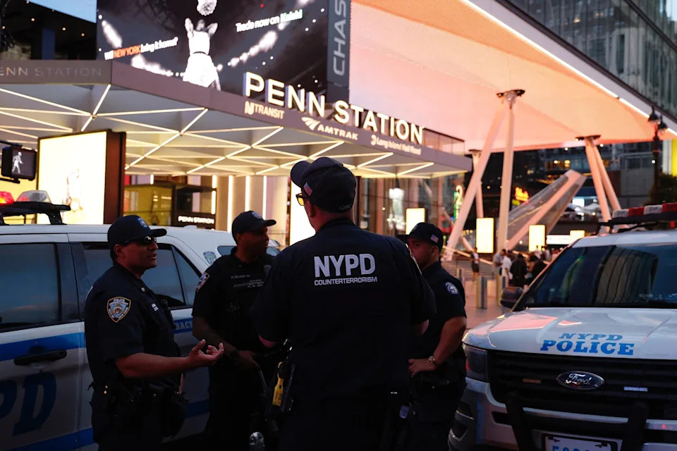 John Lamparski/AFP via Getty Images - PHOTO: NYPD police officers are seen outside Penn Station in New York on June 7, 2026.