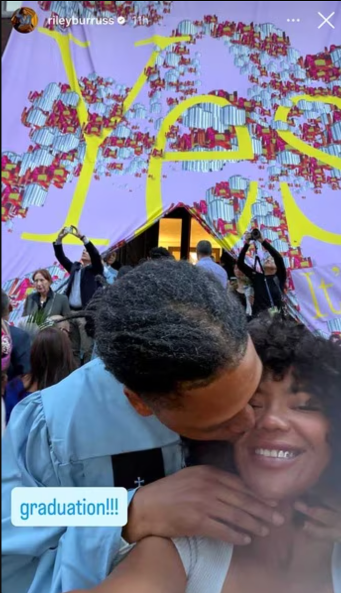 Couple embracing happily at a graduation ceremony. Couple embracing happily at a graduation ceremony.