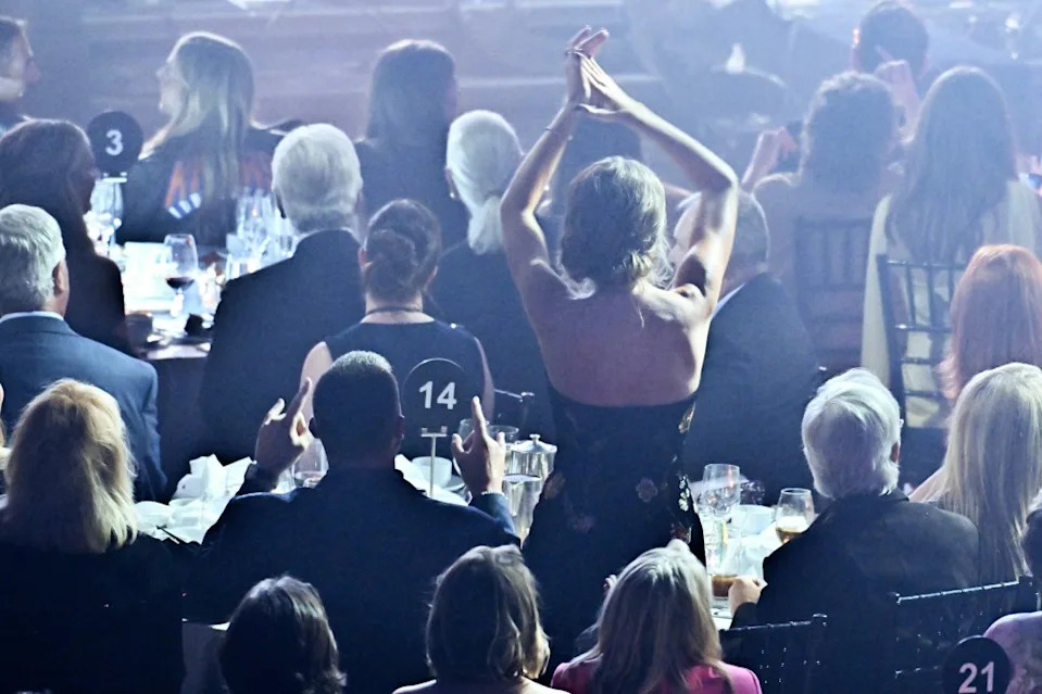 Travis Kelce showed up to support Taylor Swift as she was inducted into the Songwriters Hall of Fame Thursday in New York City. (Pictured here: The couple inside the event.) AP Photo/Evan Agostini