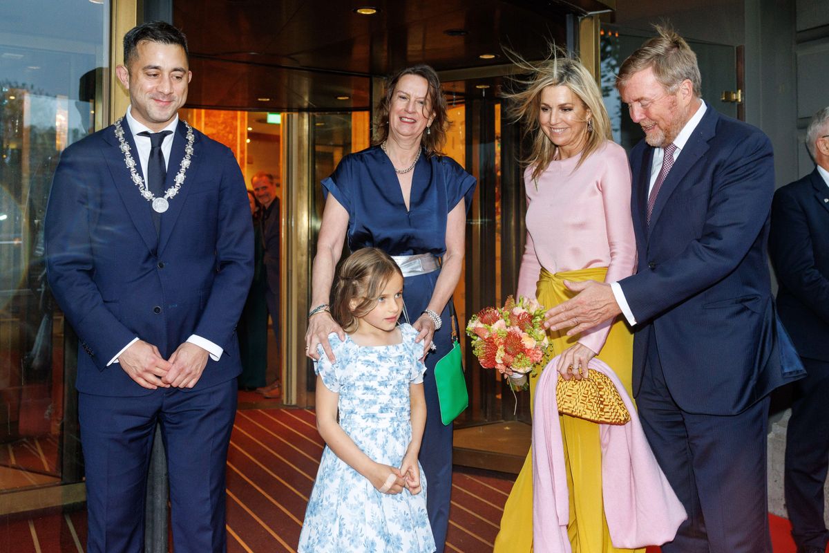 Queen Máxima presented with a hand bouquet by 7-year-old Alma Valkenburg.