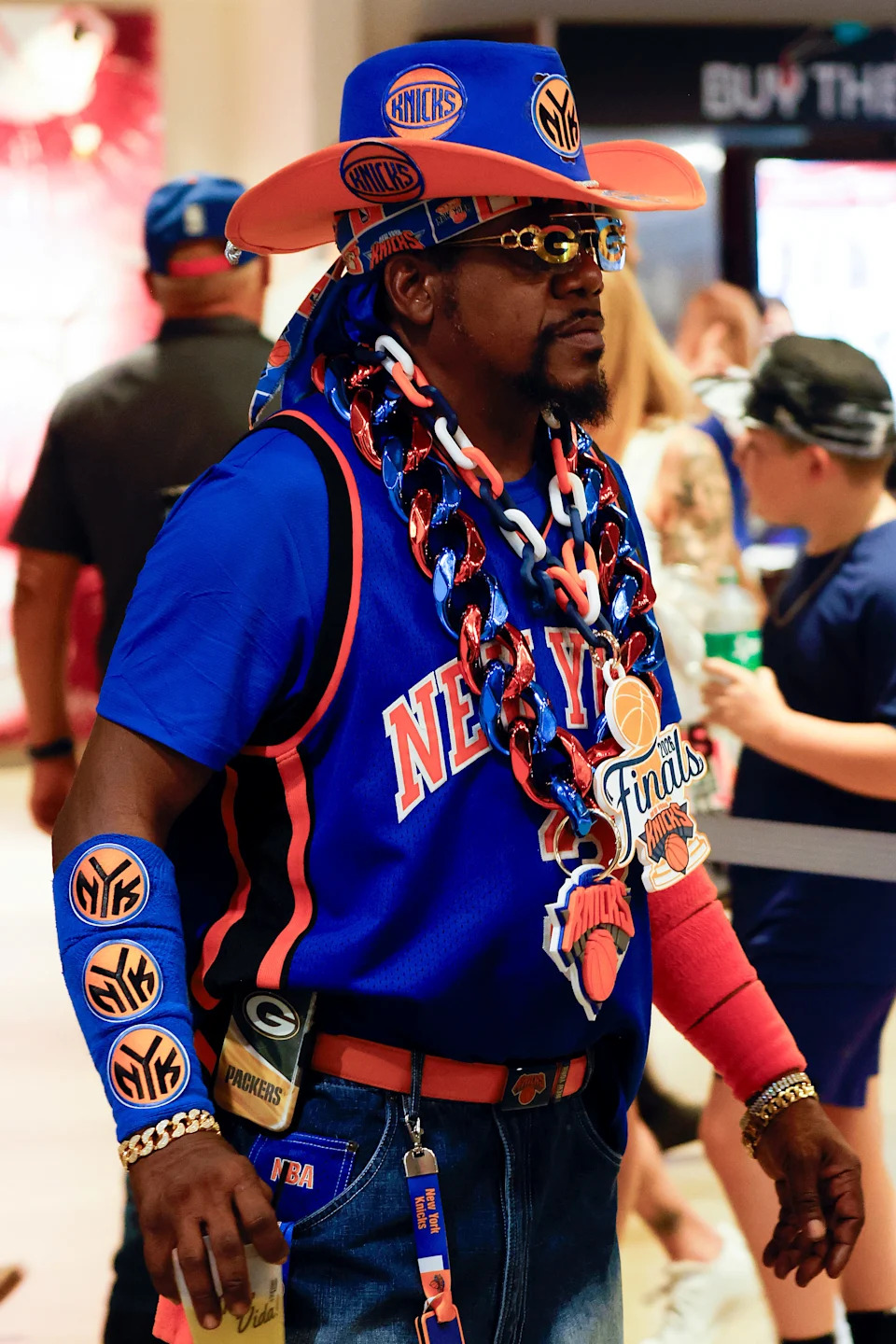 A fan is seen in Knicks attire.
