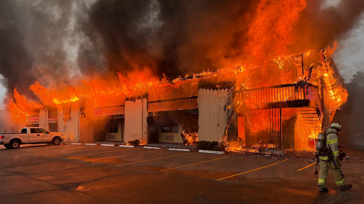 A burning building with smoke rising in New York