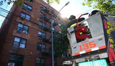 Dozen firefighters, cops injured during 5-alarm fire in Elmhurst apartment building that displaced nearly 50 households: FDNY – QNS