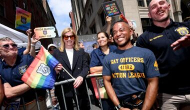 NYPD commish stands with armed gay cops on sidelines of NYC Pride March after slamming organizers for barring them
