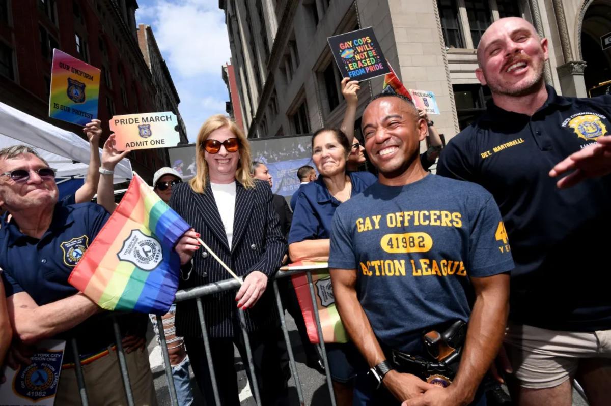 NYPD commish stands with armed gay cops on sidelines of NYC Pride March after slamming organizers for barring them