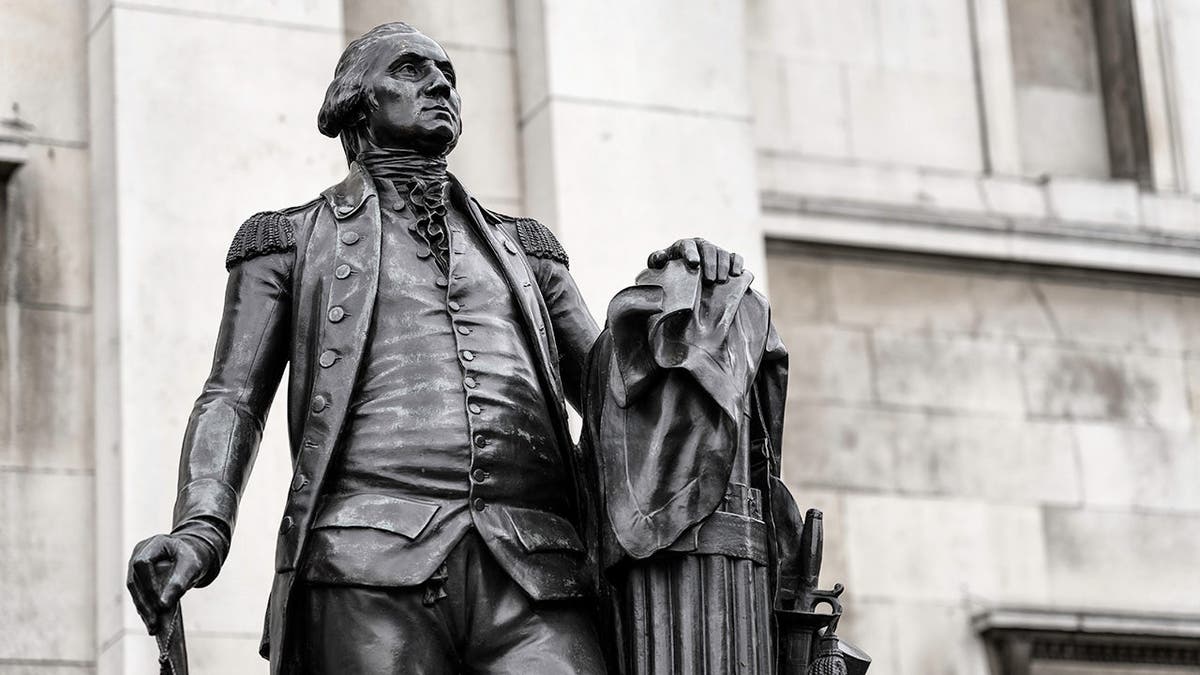 A statue of George Washington standing.