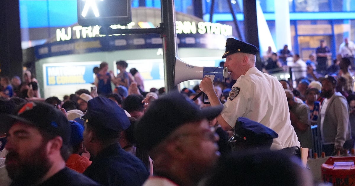 Knicks fans in New York City celebrate after their team's NBA Finals Game 2 win
