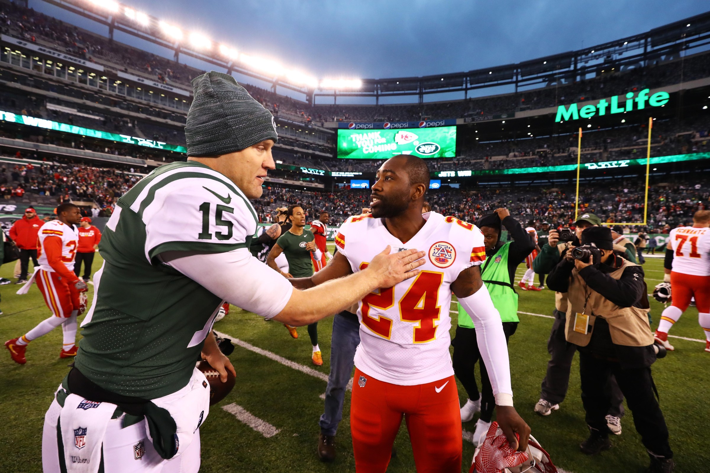 EAST RUTHERFORD, NJ - DECEMBER 03: Josh McCown #15 of the New York Jets meets with Darrelle Revis #24 of the Kansas City Chiefs after their game at MetLife Stadium on December 3, 2017 in East Rutherford, New Jersey. The New York Jets defeated the Kansas City Chiefs 38-31. (Photo by Al Bello/Getty Images)