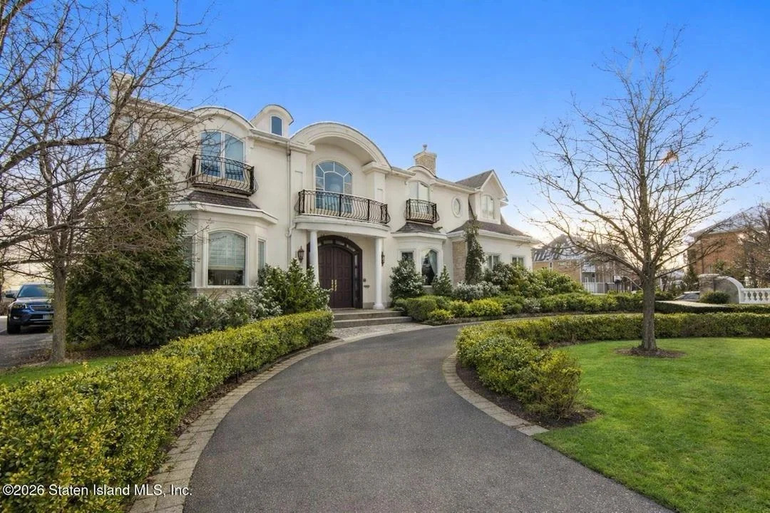 Inside a $3.1M Colonial With a Theater, Waterfront Views