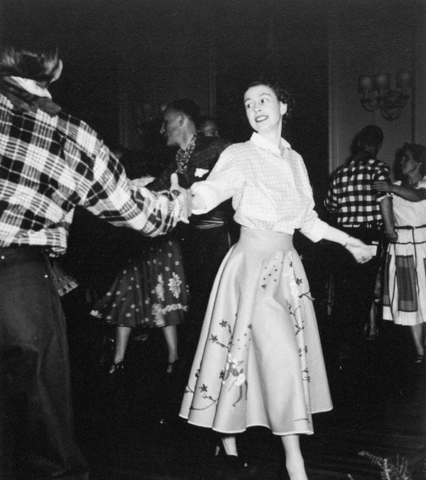 The Queen’s Maple Leaf Style: A poodle skirt and Hartnell gown