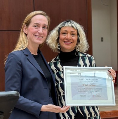 Assistant Commissioner for Gender Based Violence Policy and Planning (left) was honored at the Queens Family Justice Center for Women's History Month as one of the top women fighting gender based violence in NYC.