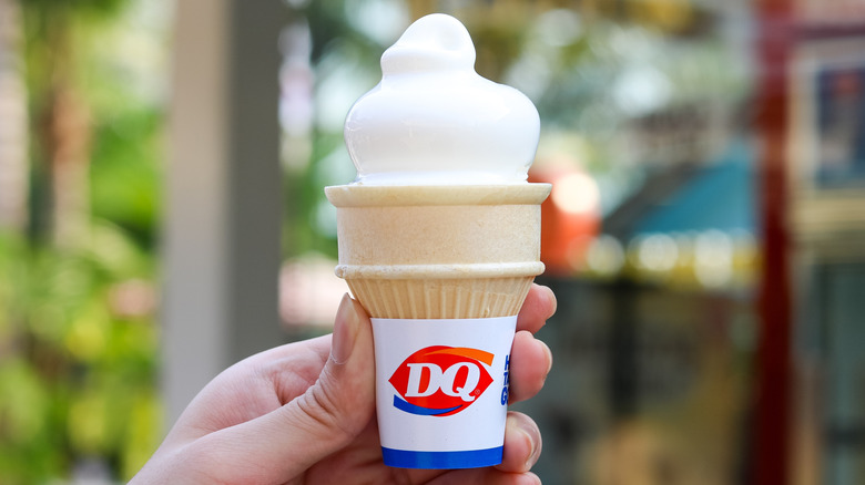 Someone holding a Dairy Queen ice cream cone