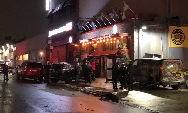 A Toyota Rav4 mounted the sidewalk after being struck by another vehicle and rammed into a restaurant on Broadway and West 104th Street in Manhattan on Jan. 2, 2023.