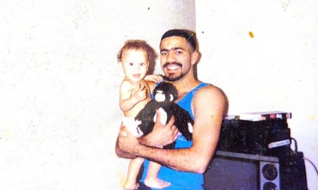 Jonathan Valentin is pictured as a baby with his uncle.
