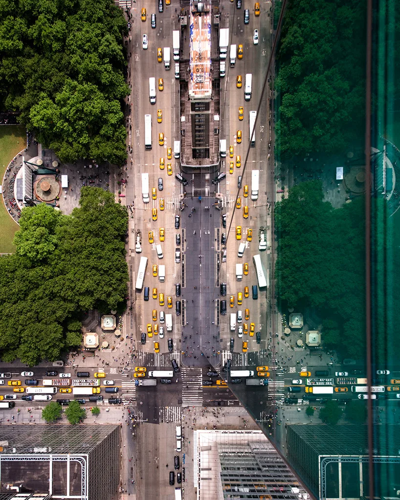 Urban landscape transformed by fractured reflections on skyscraper glass.