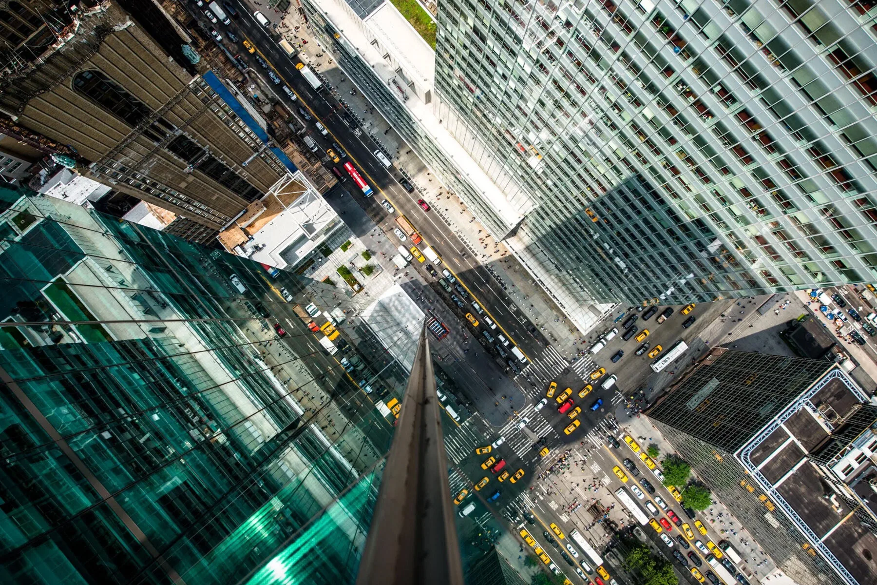 Reflection art study of Manhattan's cityscape on glass facades.