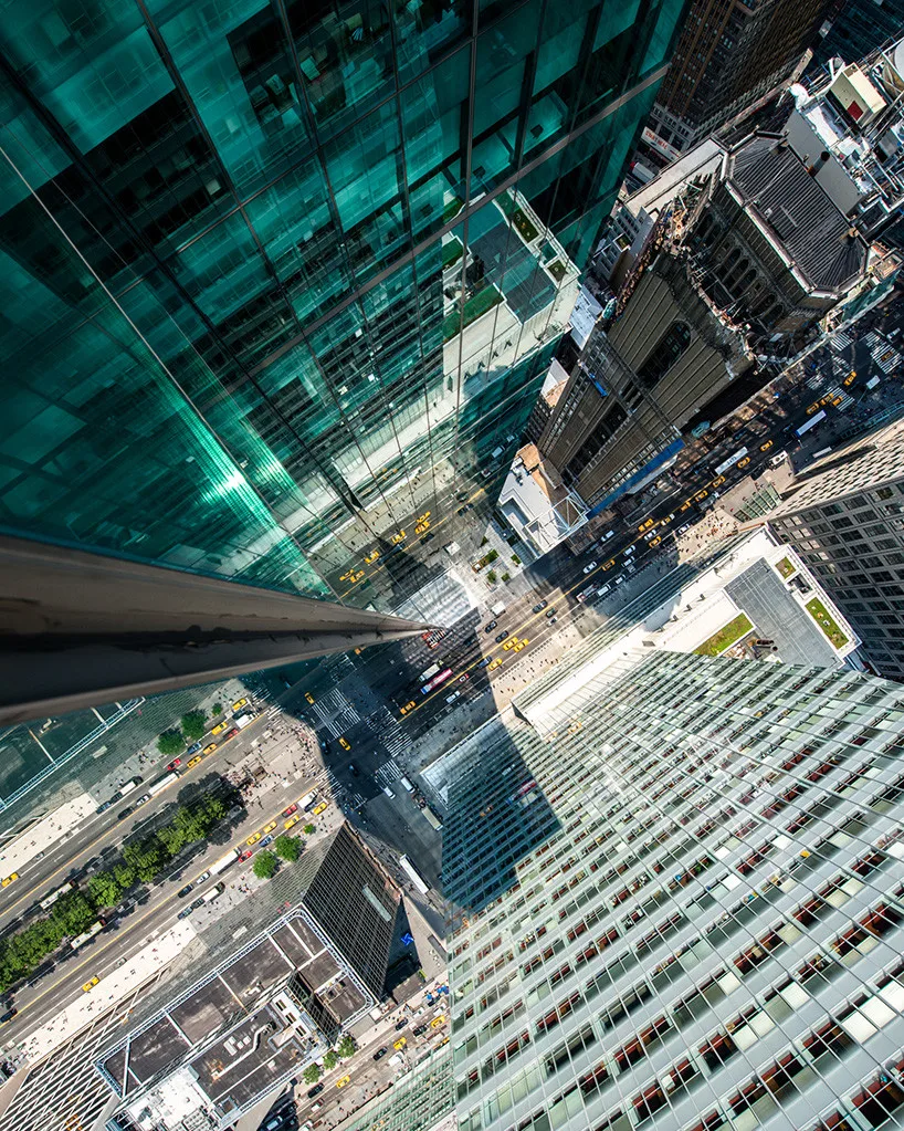 Cityscape perceived through fractured and varied glass reflections.