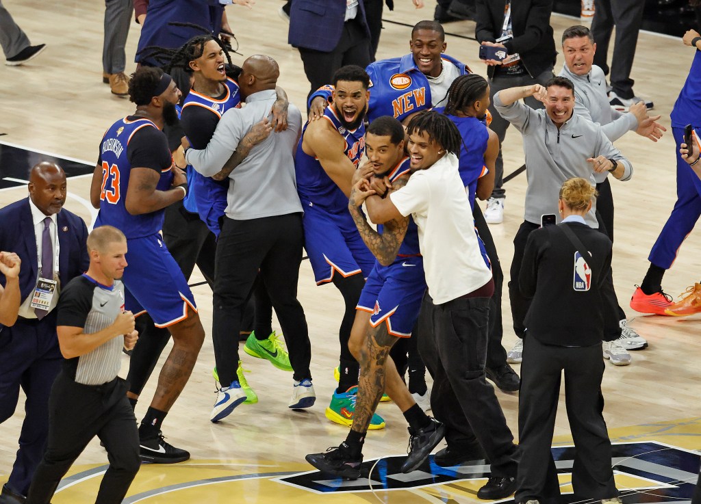 Karl-Anthony Towns and his New York Knicks teammates celebrate their 2026 NBA Finals championship.