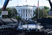 An image collage containing 1 images, Image 1 shows A media preview of the UFC "Claw" and octagon fighting ring set up on the South Lawn of the White House