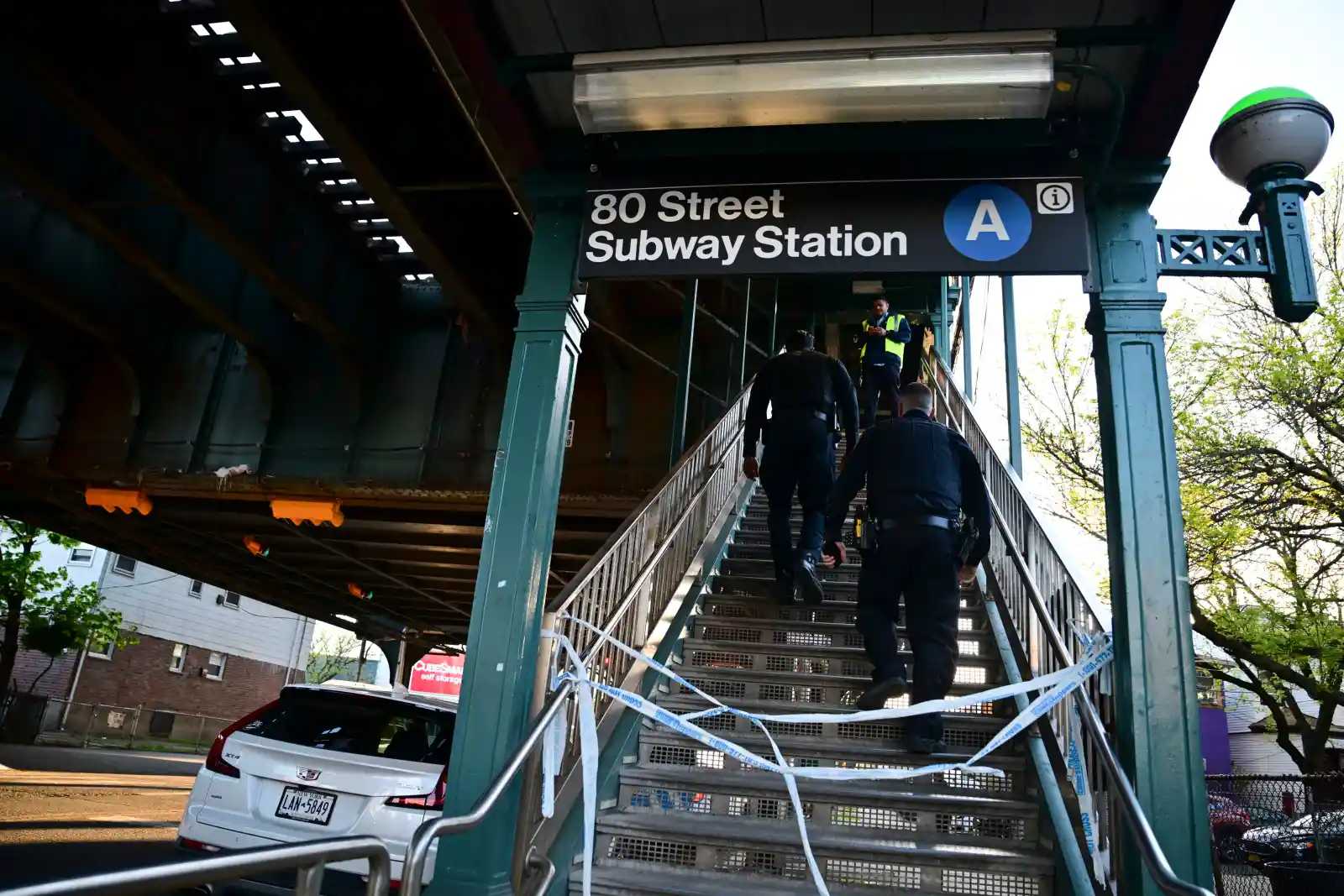Police from the 106th Precinct in Ozone Park heading up to the 80th Street subway station after Rodriguez shot a teen who was fighting with his 16-year-old co-defendant from Far Rockaway. 