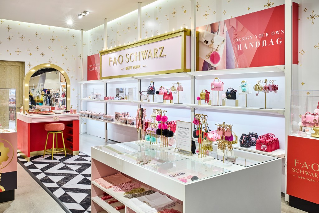 The FAO Schwarz "Jewel Box" experience in Nordstrom, featuring a "Design Your Own Handbag" station and a "Fabulous Makeover" area.