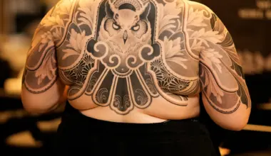 blackwork owl tattoo with ornamental by undulmood