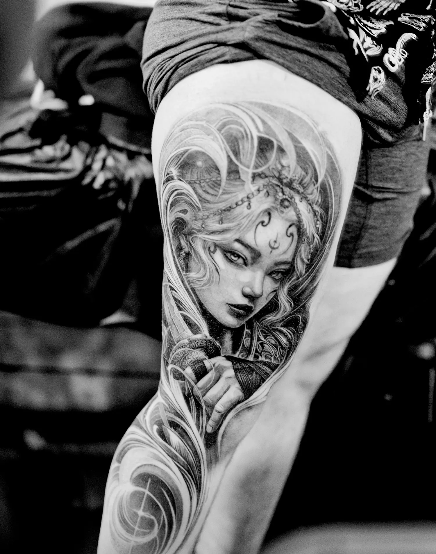 black and gray fantasy leg tattoo by sumok kim