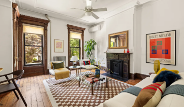parlor with stone mantel