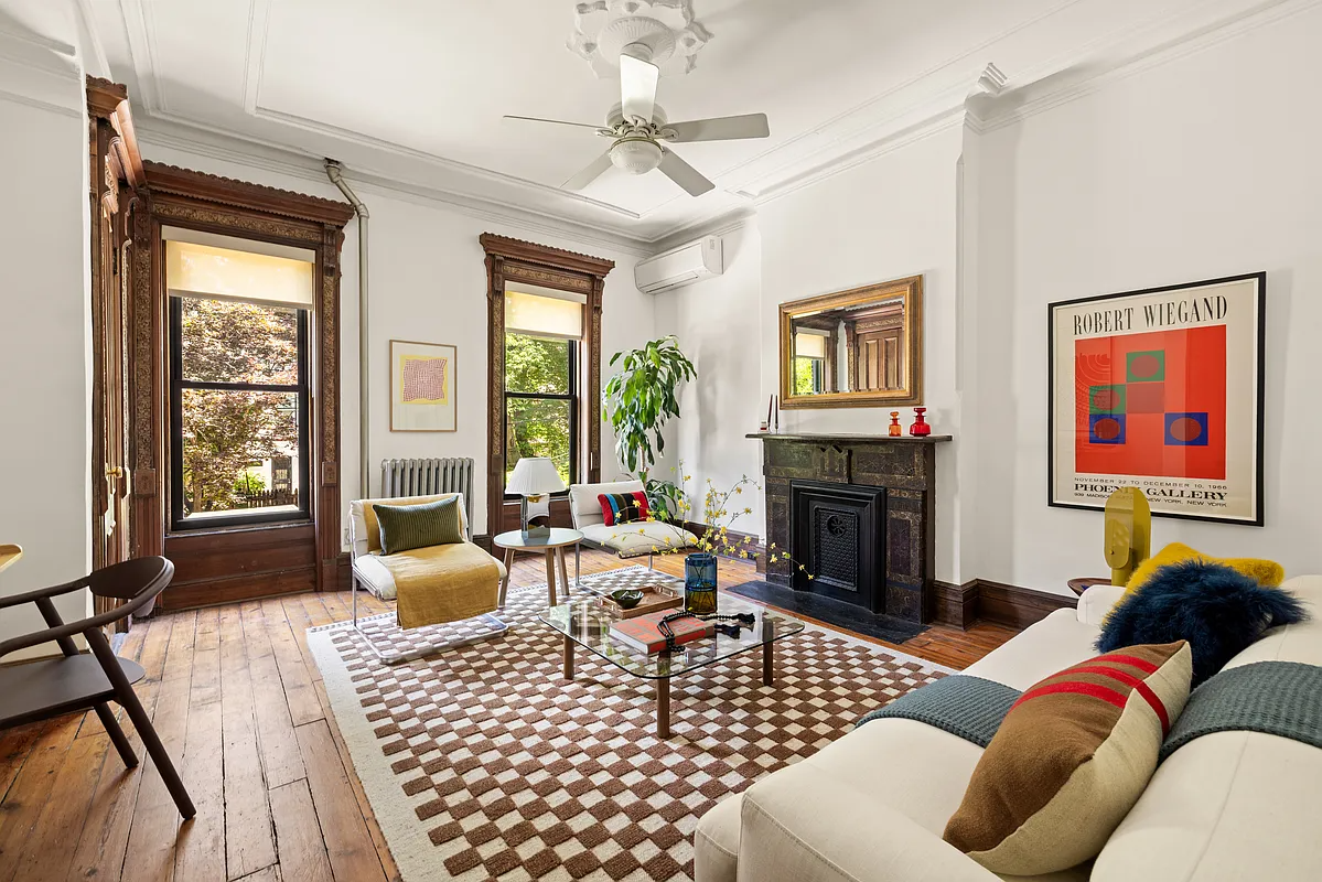 parlor with stone mantel