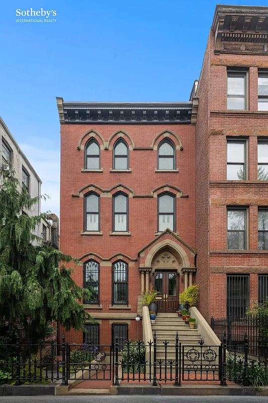 brick row house exterior with gothic details