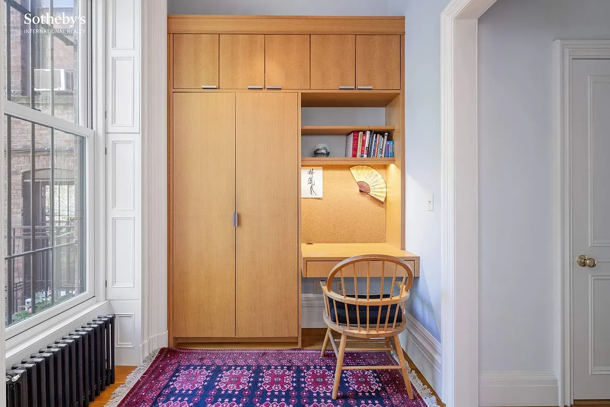 built-in desk and storage in kitchen