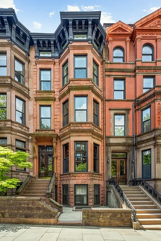 exterior of a brownstone with an angled bay