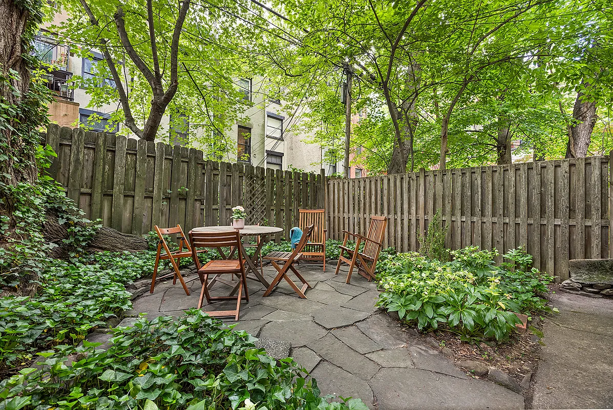 rear yard with paved area for dining