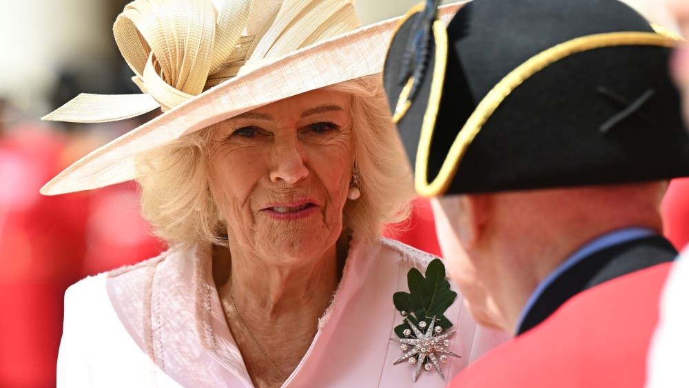 Queen Camilla wears Queen Elizabeth's diamond star brooch at the 2026 Chelsea Pensioners Founder's Day at Royal Hospital Chelsea on June 4 in London.